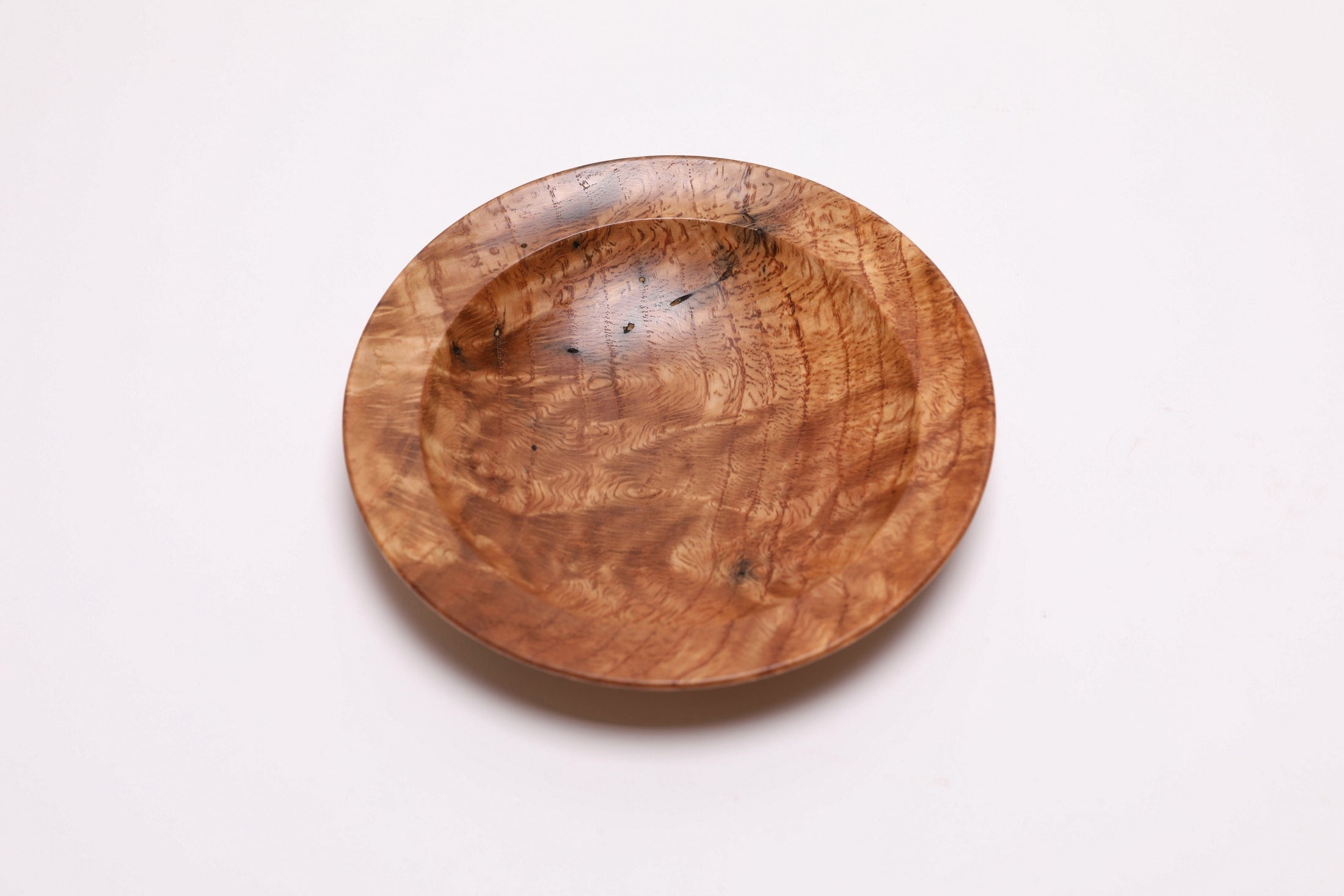 Wormy white oak crotch burl wooden bowl, top view at 90°, highlighting burl figure and natural grain pattern