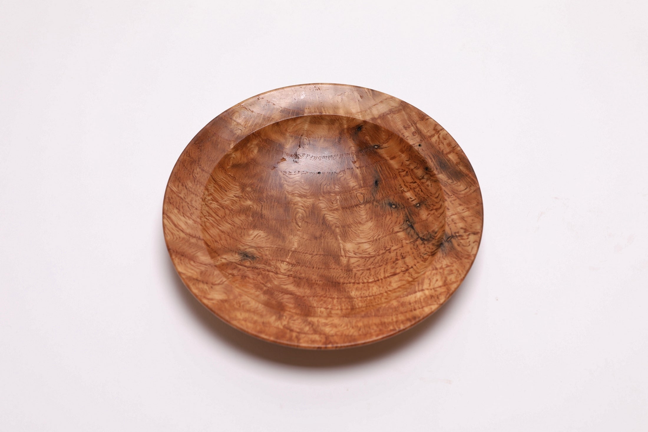 Wormy white oak crotch burl wooden bowl, top view at 180°, rich crotch burl figure and worm hole detail