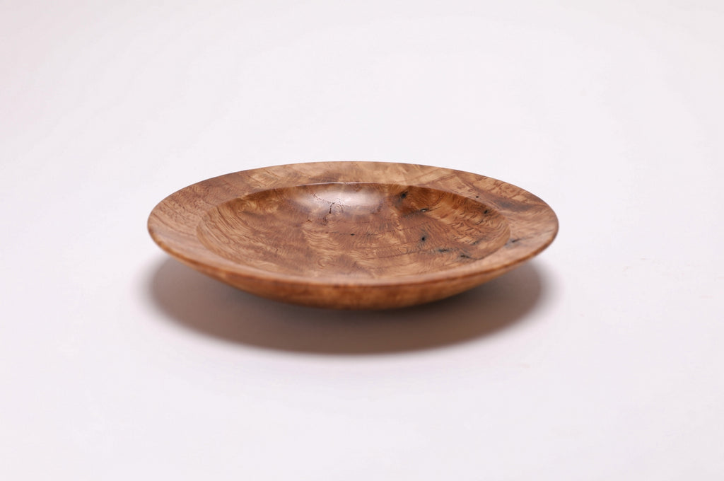 Wormy white oak crotch burl wooden bowl, side view at 90°, natural oil finish and turned form