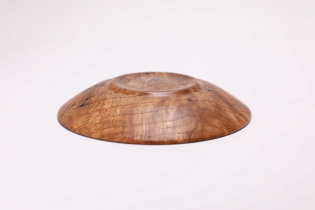 Wormy white oak crotch burl wooden bowl, bottom view showing natural finish and handcrafted base