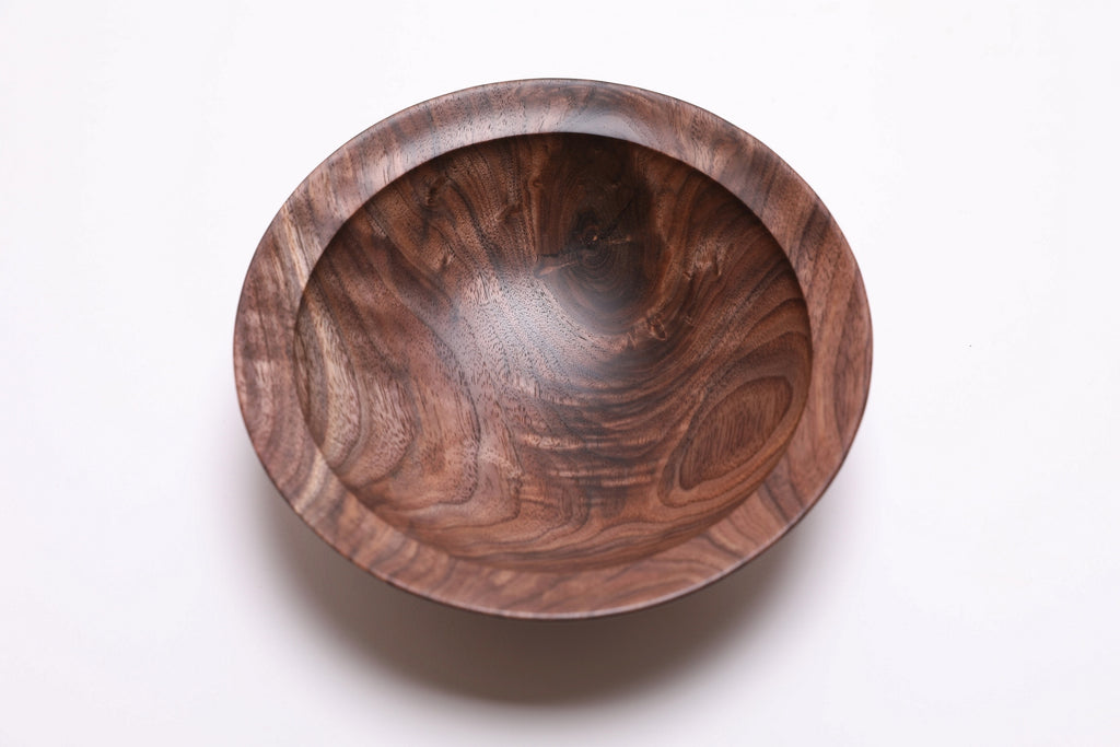 Wild black walnut crotch burl wooden bowl, top view at 0°, showing crotch burl figure and repaired knot