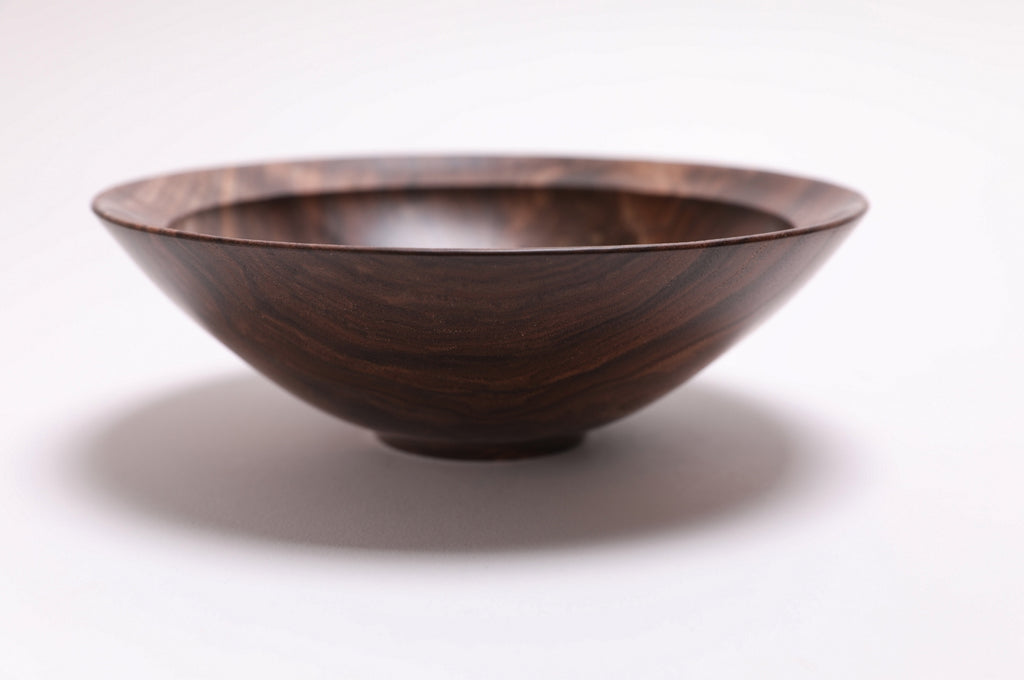Wild black walnut crotch burl wooden bowl, side view at 180°, natural oil finish and turned form