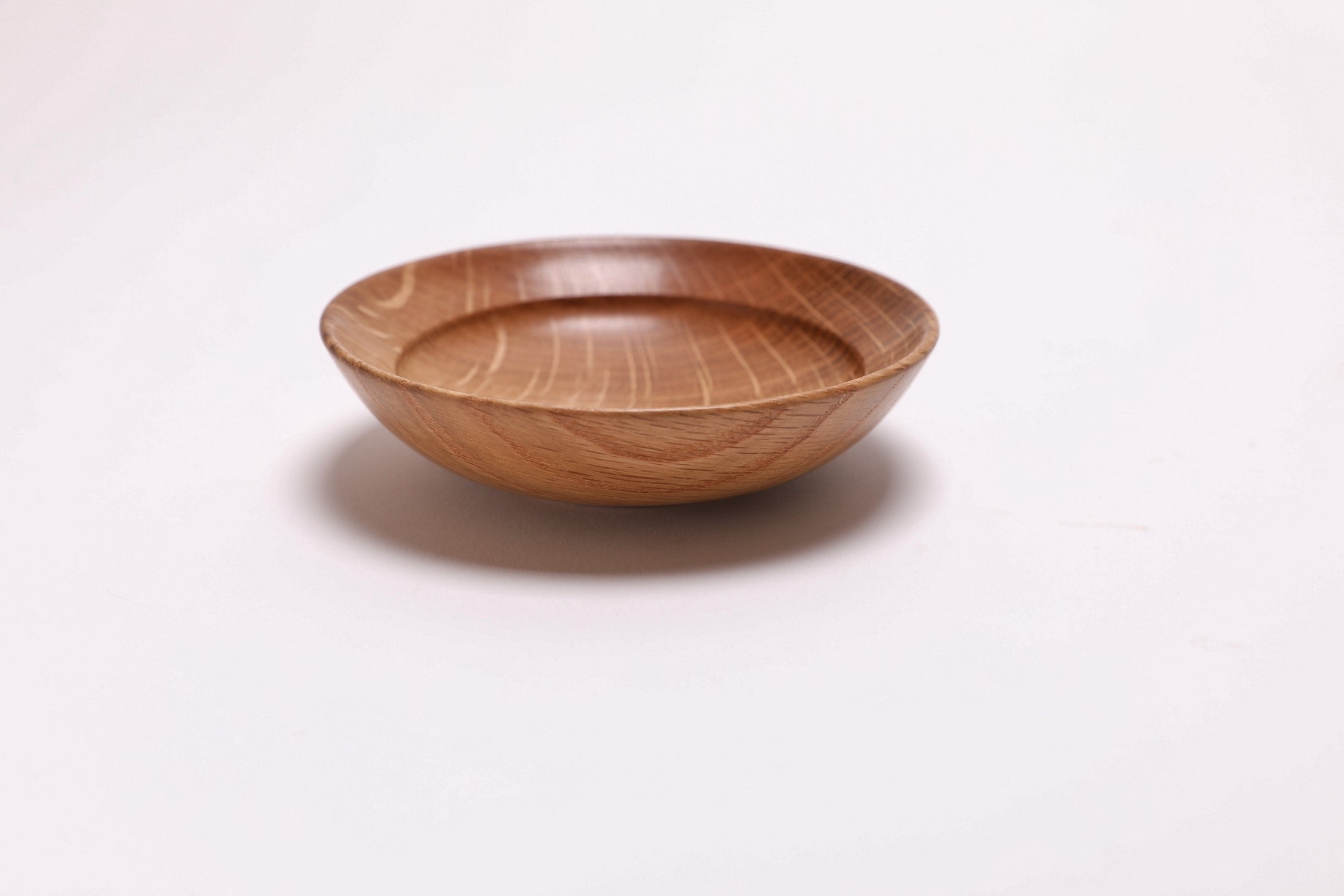 Quartersawn white oak wooden ring dish, side view at 180°, natural oil finish and turned form