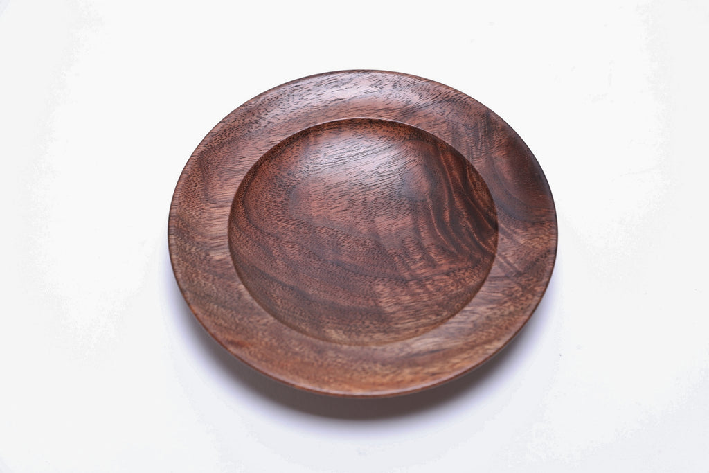 Black walnut crotch burl wooden jewelry dish, top view at 90°, highlighting amber red grain and crotch burl pattern