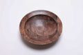 Curly wild black walnut wooden bowl, top view at 0°, showing curly growth rings and bud scars