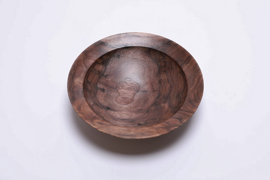 Curly wild black walnut wooden bowl, top view at 270°, rich figure and food-safe oil finish