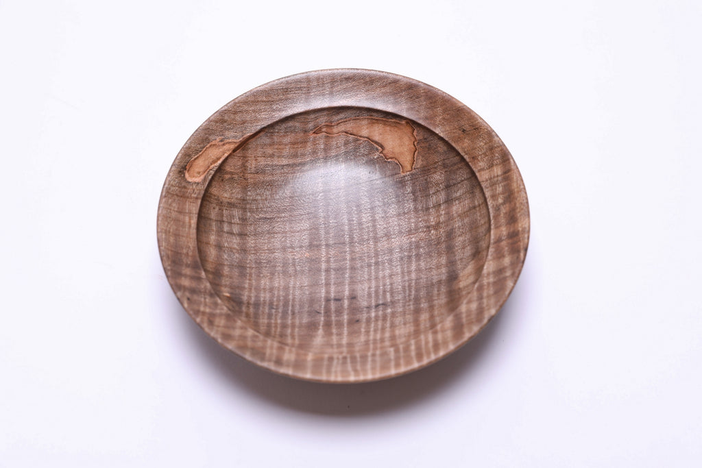 Spalted tiger ambrosia maple wooden bowl, top view at 0°, showing chatoyant tiger figure and amber gray coloration