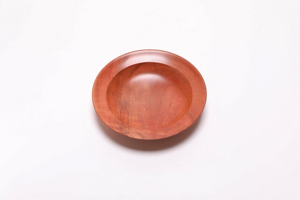 Wild black cherry wooden ring dish, top view, 270°, raised foot and undercut rim visible