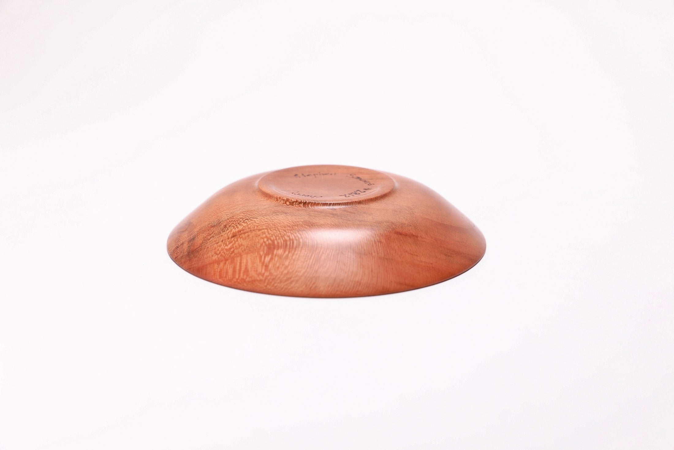 Wild black cherry wooden ring dish, bottom view, raised foot and Sanders Woodworking craftsmanship
