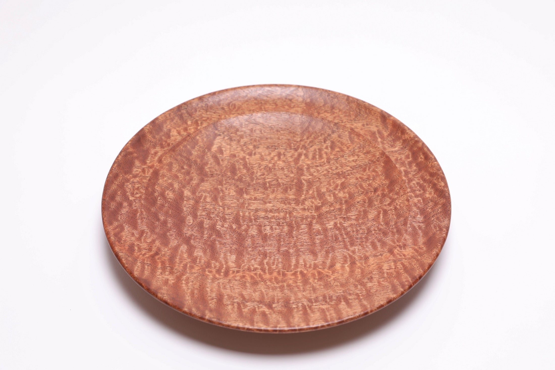 Pommele sapele shallow bowl top view, handmade by Sanders Woodworking