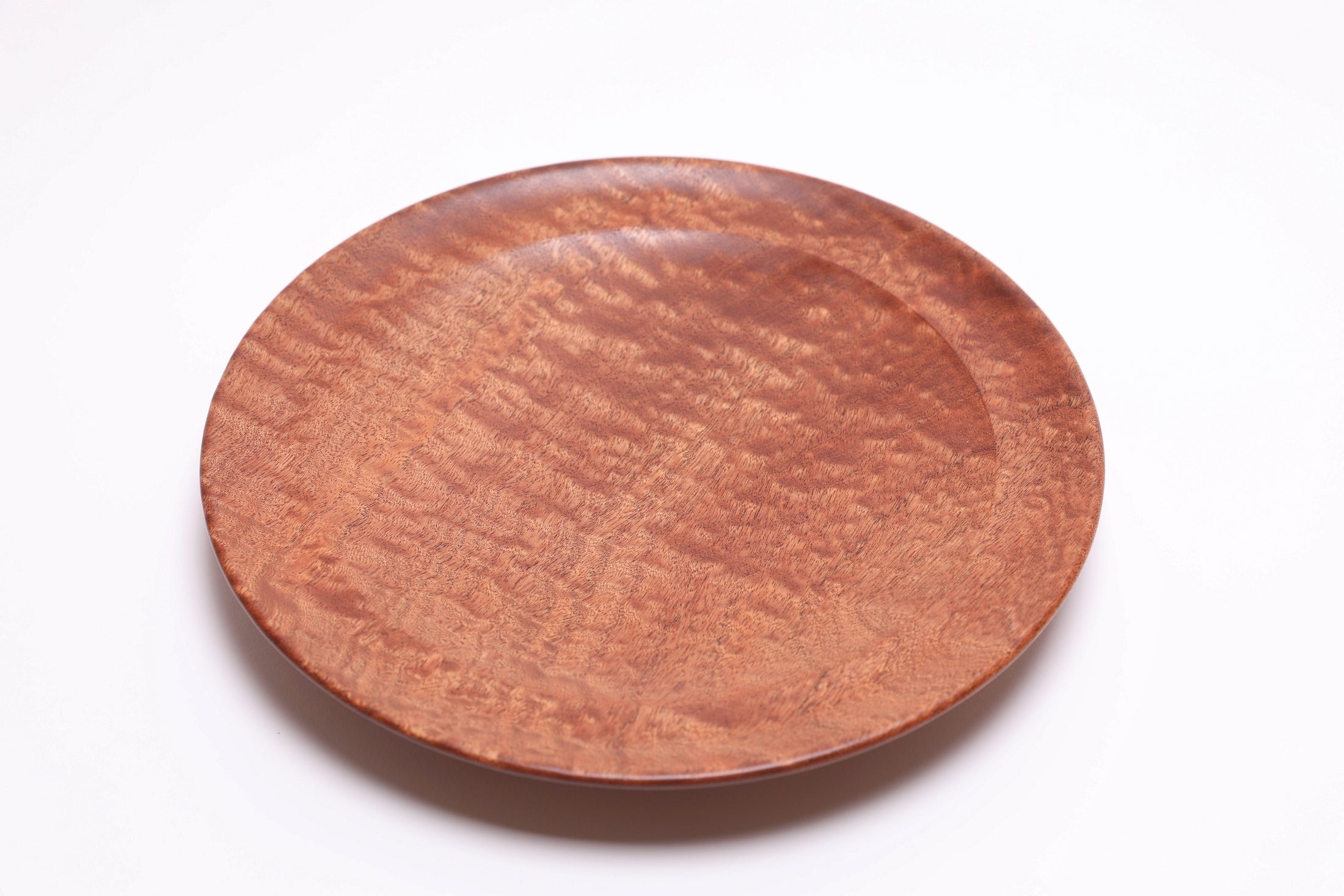 Pommele sapele shallow bowl top view 9, undercut rim and raised foot detail