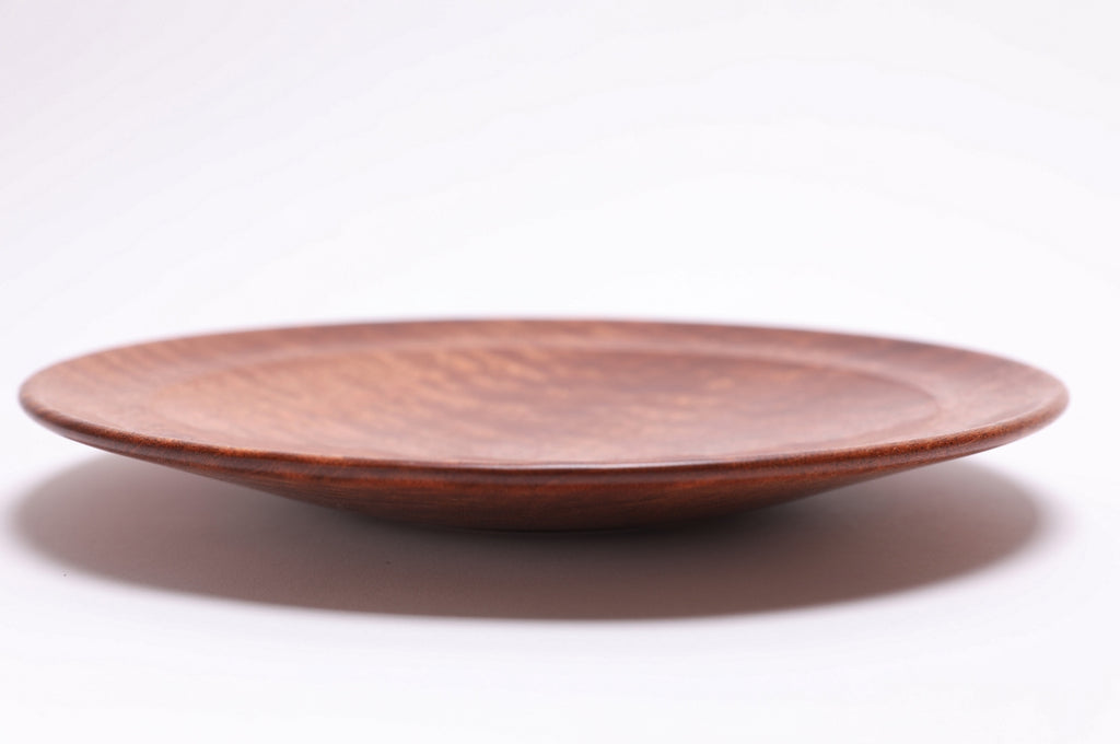 Pommele sapele shallow bowl side view, curved taper and raised foot profile