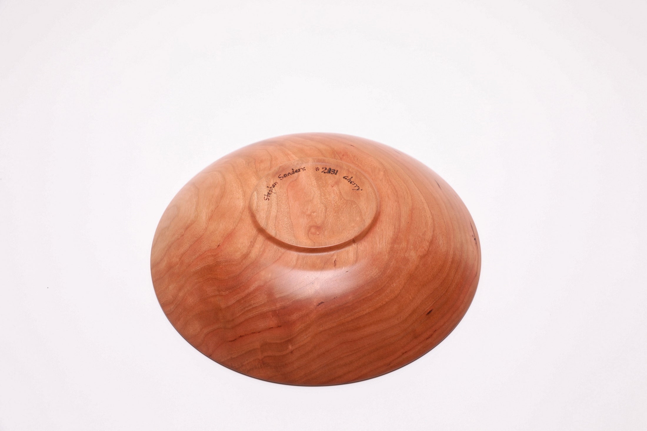 Wild black cherry wooden bowl bottom view, raised foot and food-safe oil finish, Sanders Woodworking