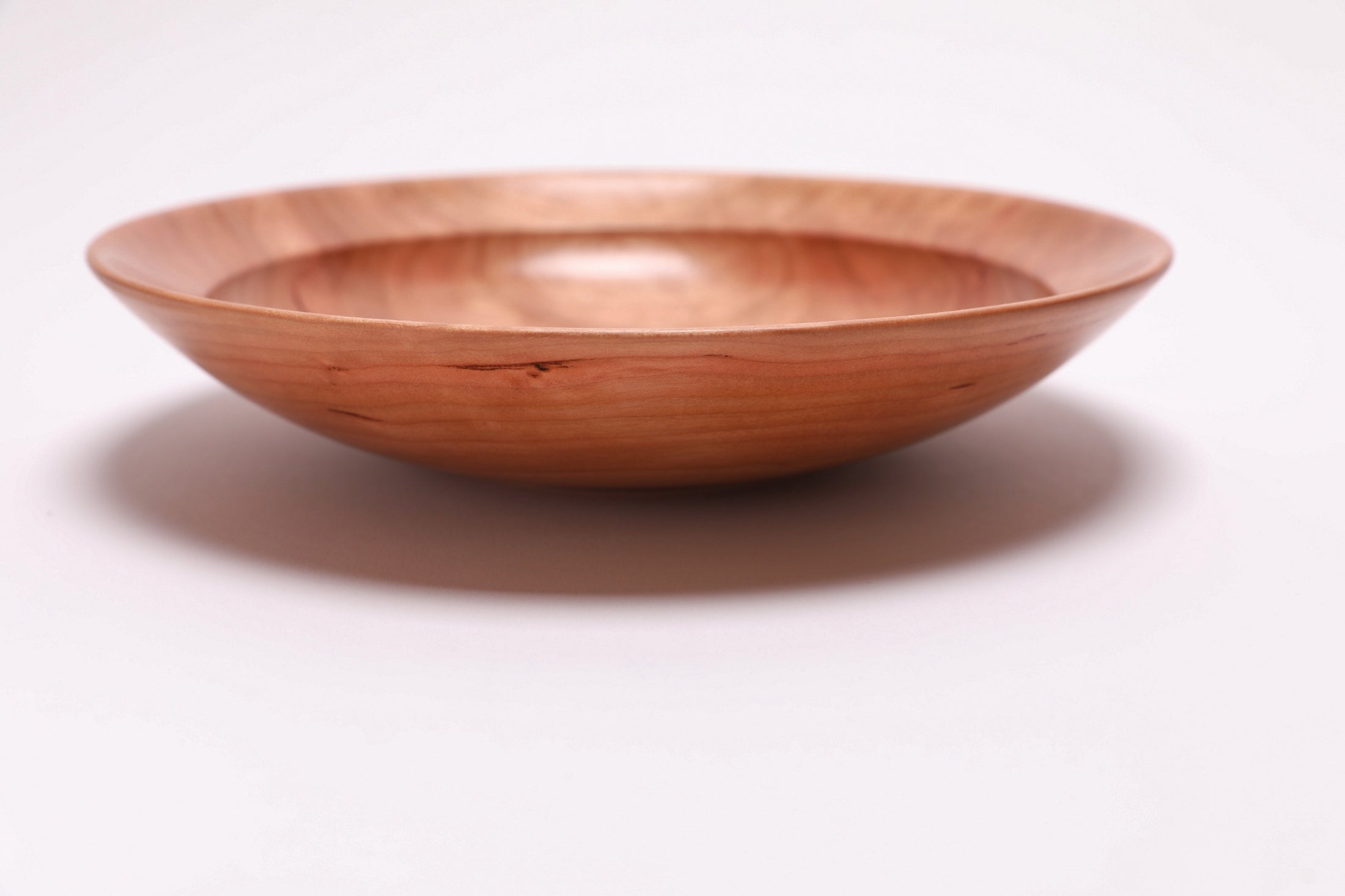 Wild black cherry wooden bowl side view 180 degrees, hand-turned profile and natural finish