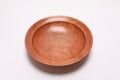Handcrafted wild black cherry wooden bowl, top view – rich orange-pink grain with amber growth ring lines, 10 1/8" diameter