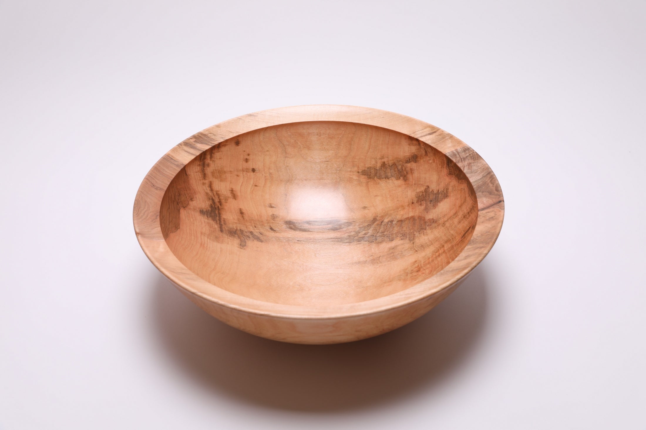 Handcrafted large sugar maple salad and fruit bowl, top view – dark brown heartwood and gray-green splotches, 16" diameter