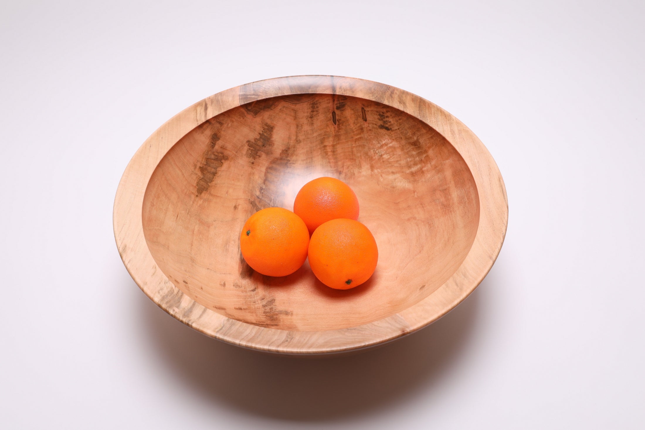 Large sugar maple salad bowl shown with three oranges for scale – 16" x 5 1/4" handcrafted wood bowl