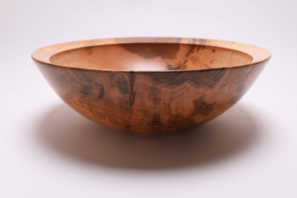 Large sugar maple bowl side view rotated 90°, deep 5 1/4" profile and natural oil finish