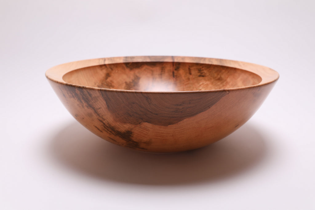 Large sugar maple bowl side view rotated 270°, undercut rim and striking wood figure