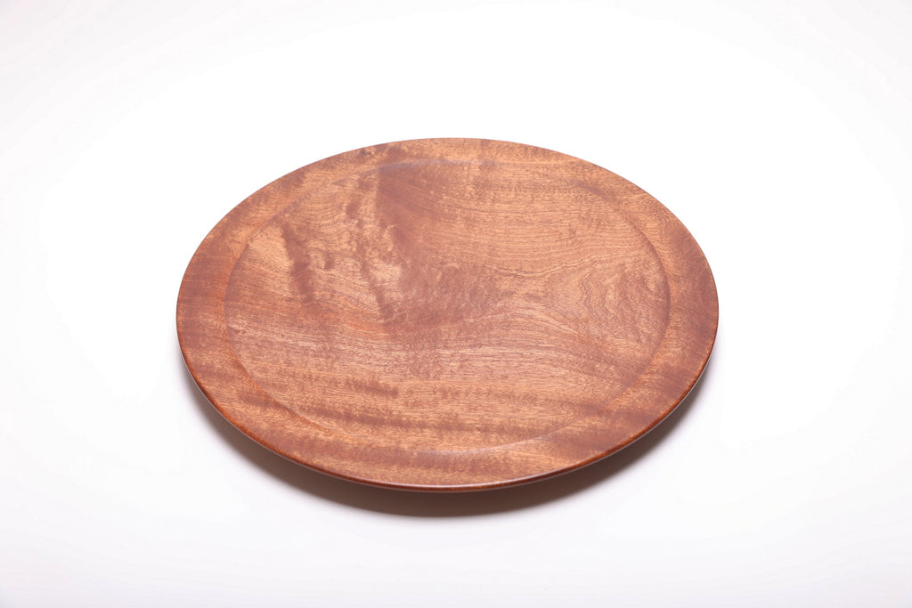 Handcrafted large Khaya African mahogany serving platter, top view – iridescent grain with food-safe oil finish, 19 1/2" diameter