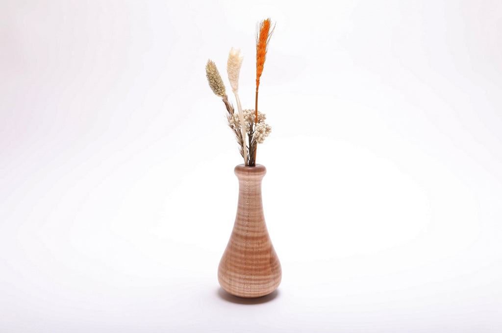 Handcrafted tiger maple weed pot with dried flowers (not included), side view – chatoyant figure and natural oil finish, 2 3/4" x 5 1/4"