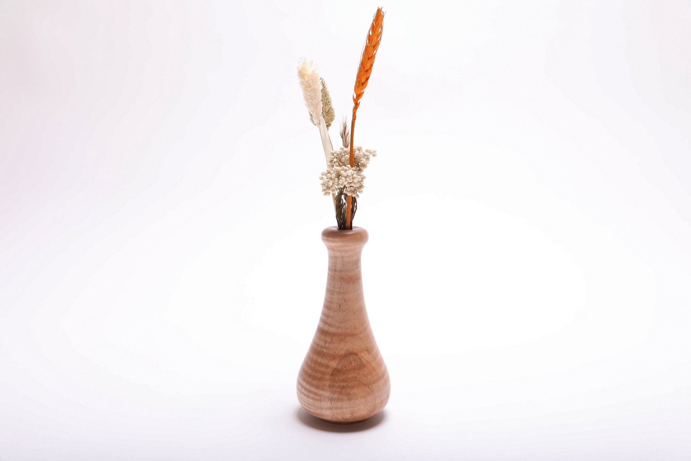 Tiger maple weed pot with dried flowers (not included), side view rotated 45° – curly figure and iridescent wood grain