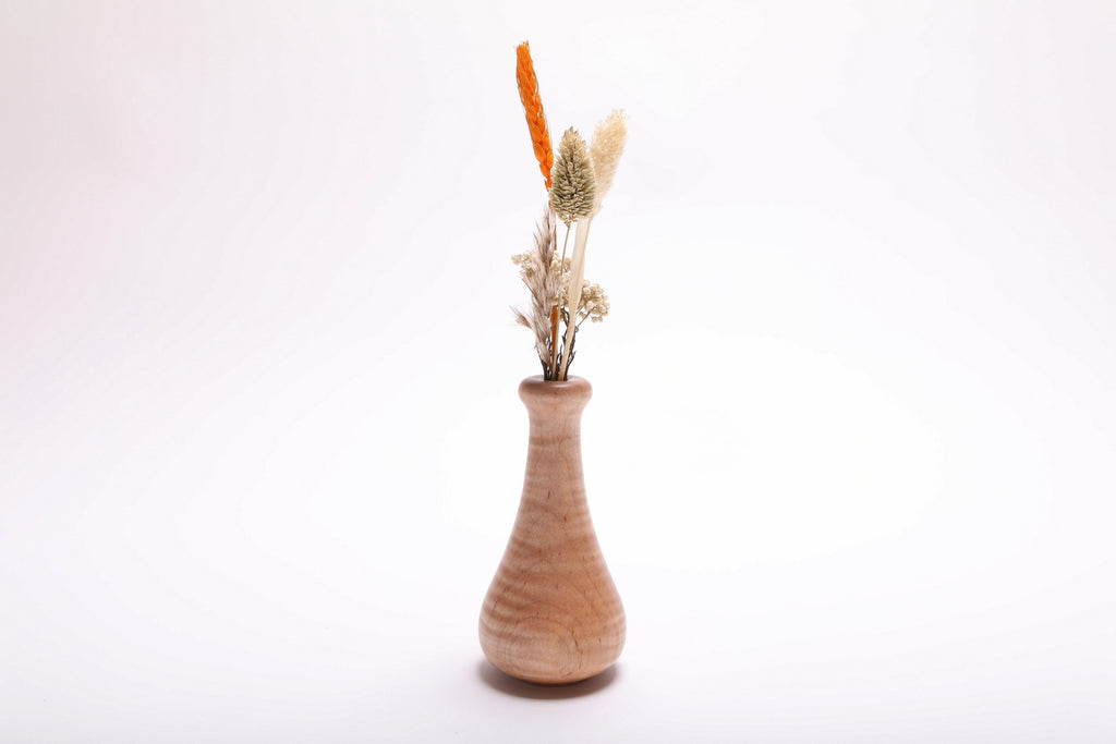 Tiger maple weed pot with dried flowers (not included), side view rotated 180° – full figure visible across turned wood surface