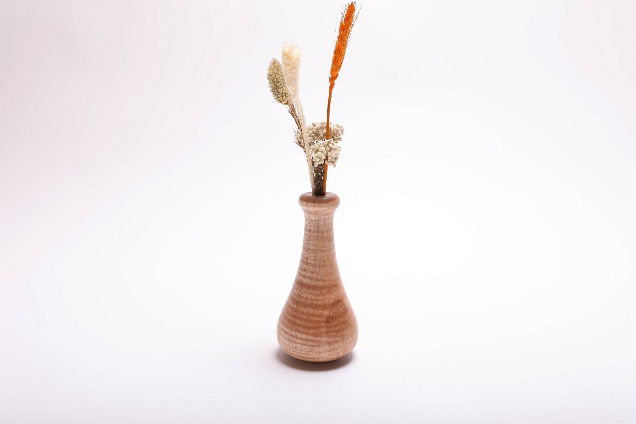 Tiger maple weed pot with dried flowers (not included), side view rotated 270° – chatoyant tiger maple grain detail