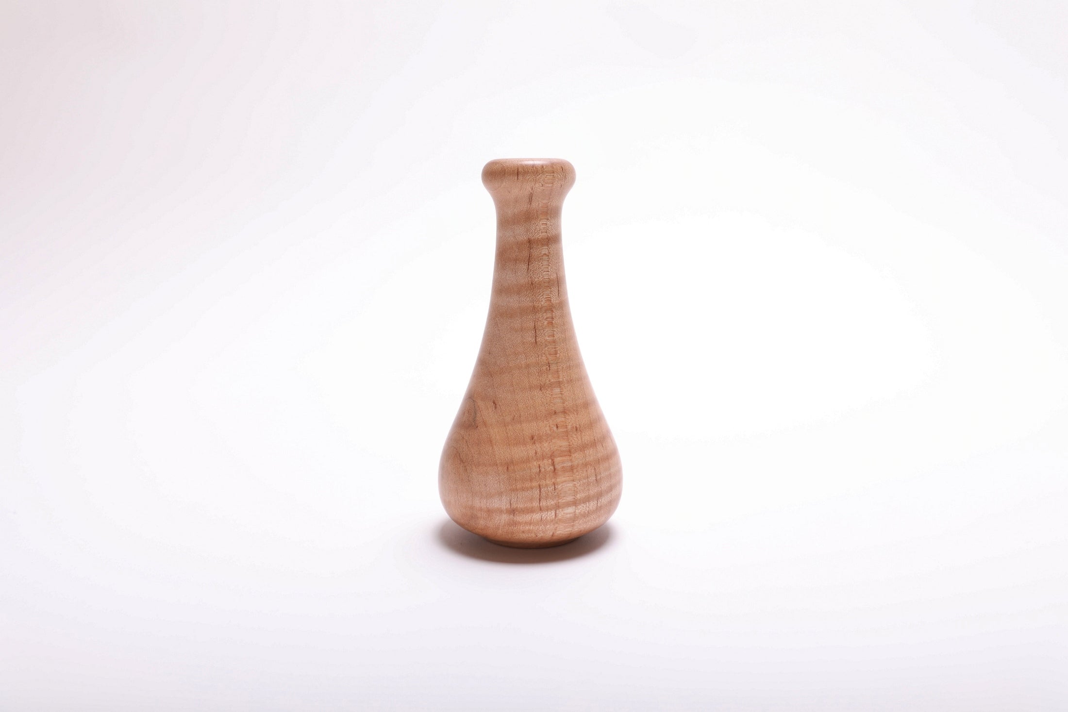 Tiger maple weed pot side view without flowers – showing full profile, natural oil finish, and wood figure