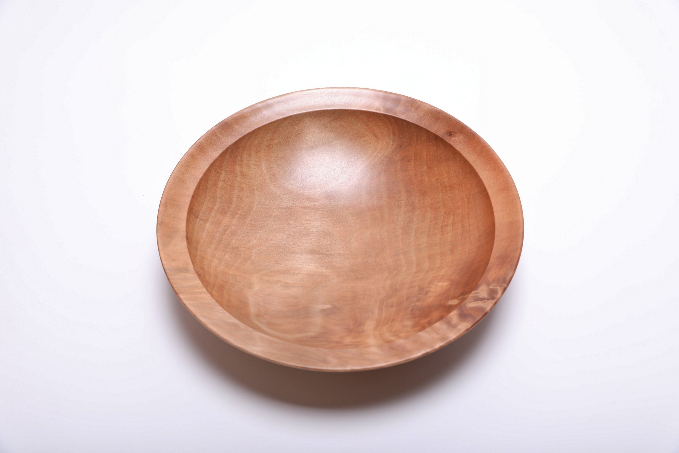 Sweet gum wooden bowl top view rotated 90°, crotch burl patch and natural wood character