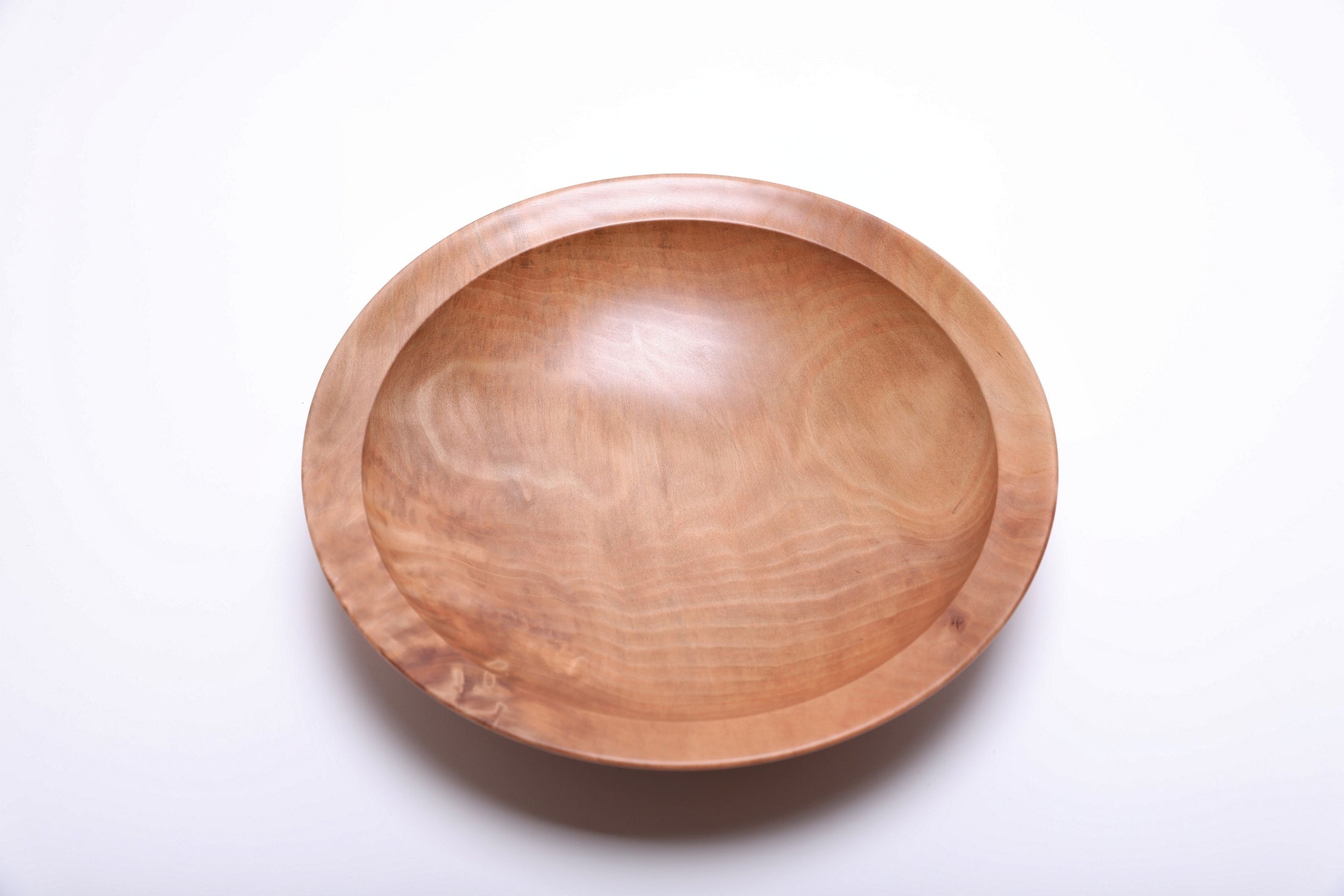Sweet gum wooden bowl top view rotated 180°, wavy growth ring transition lines and food-safe oil finish
