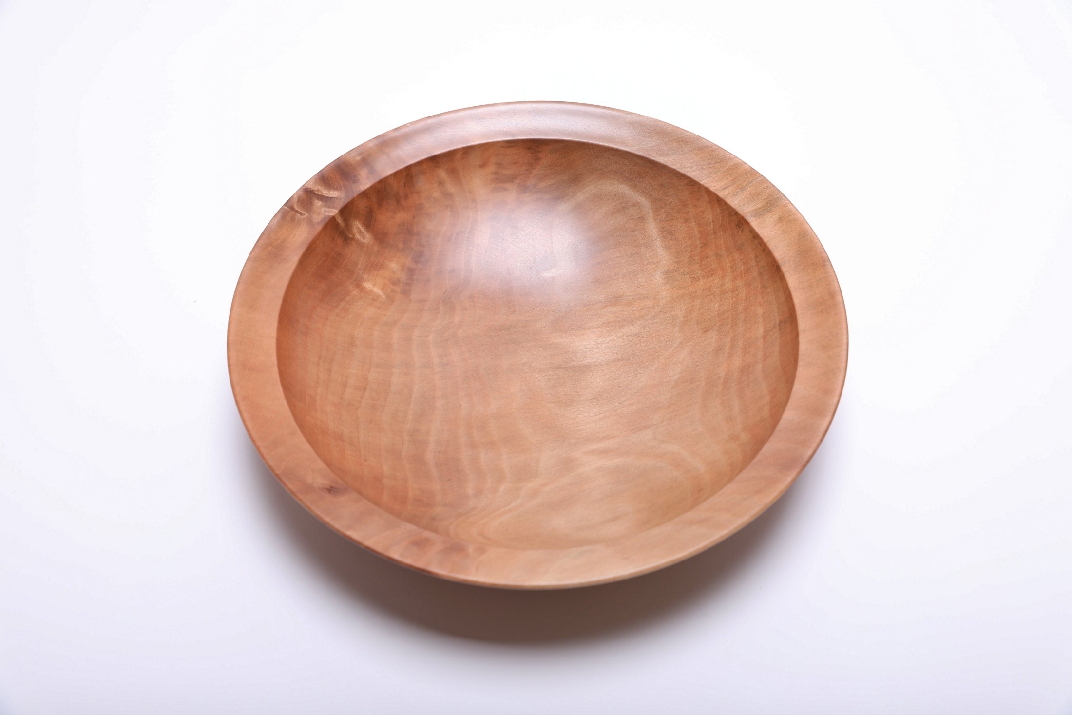 Sweet gum wooden bowl top view rotated 270°, burl figure and undercut rim detail