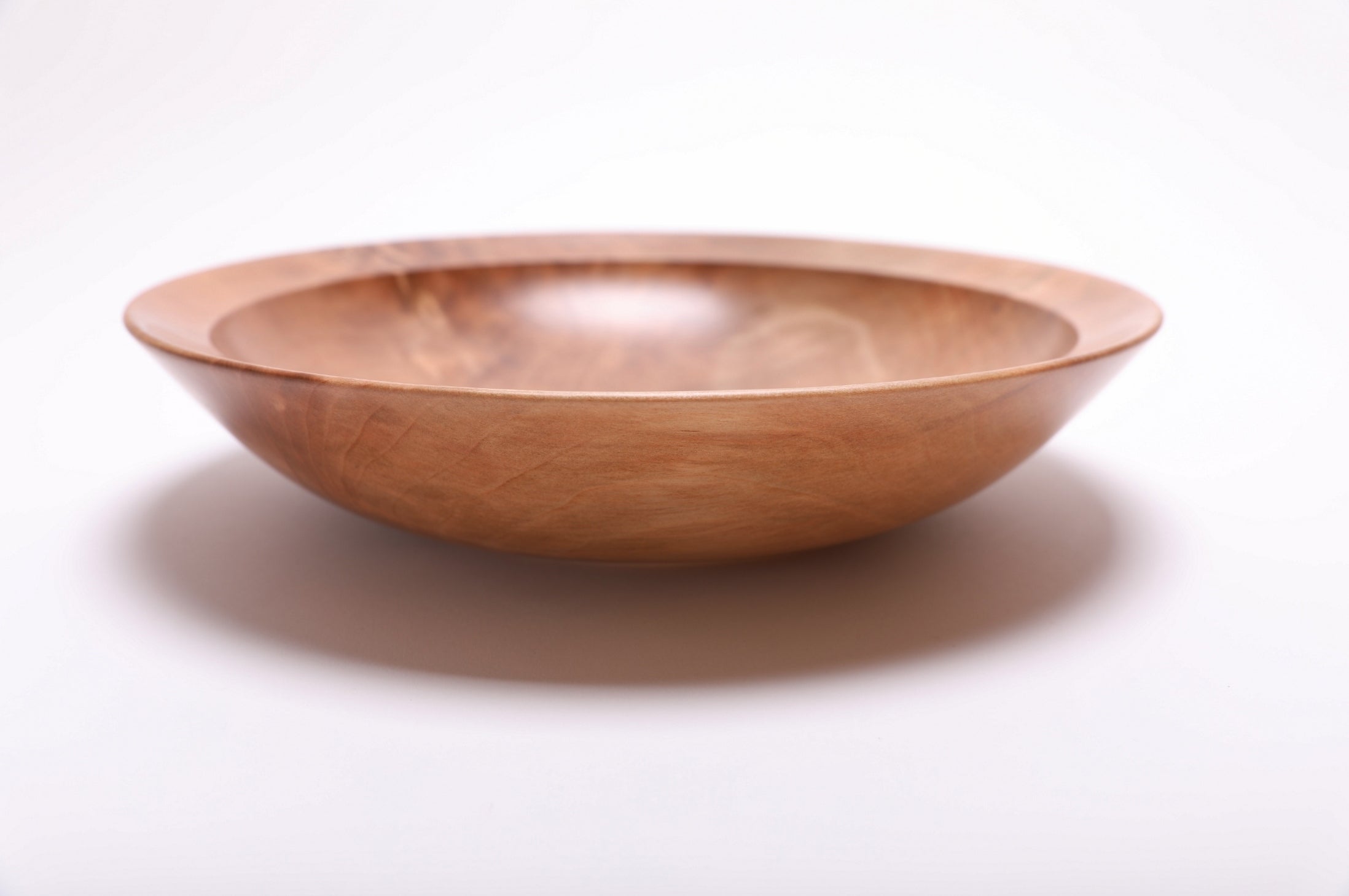 Sweet gum wooden bowl side view rotated 90°, 2 1/2" profile and natural oil finish