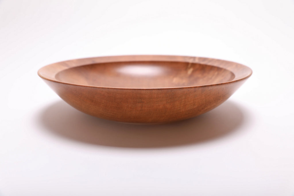 Sweet gum wooden bowl side view rotated 180°, curved taper and raised foot detail