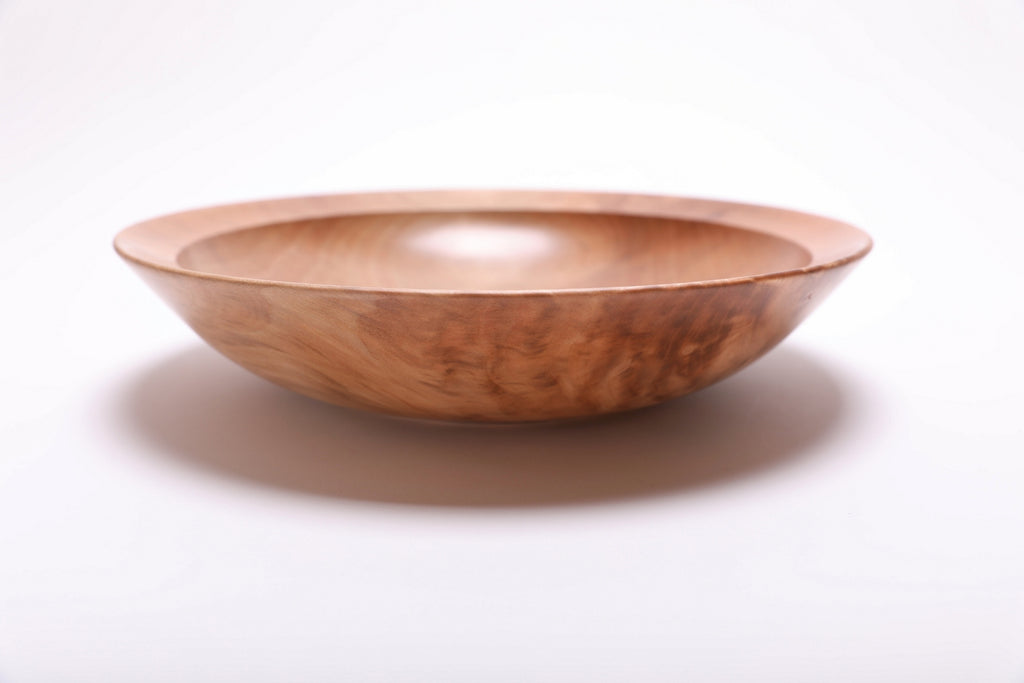 Sweet gum wooden bowl side view rotated 270°, undercut rim and burl wood grain