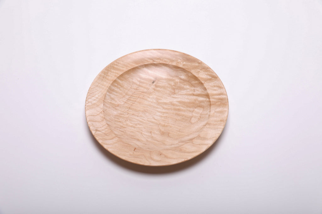 Curly quilted maple shallow bowl top view rotated 135°, rare quilted maple grain and food-safe oil finish
