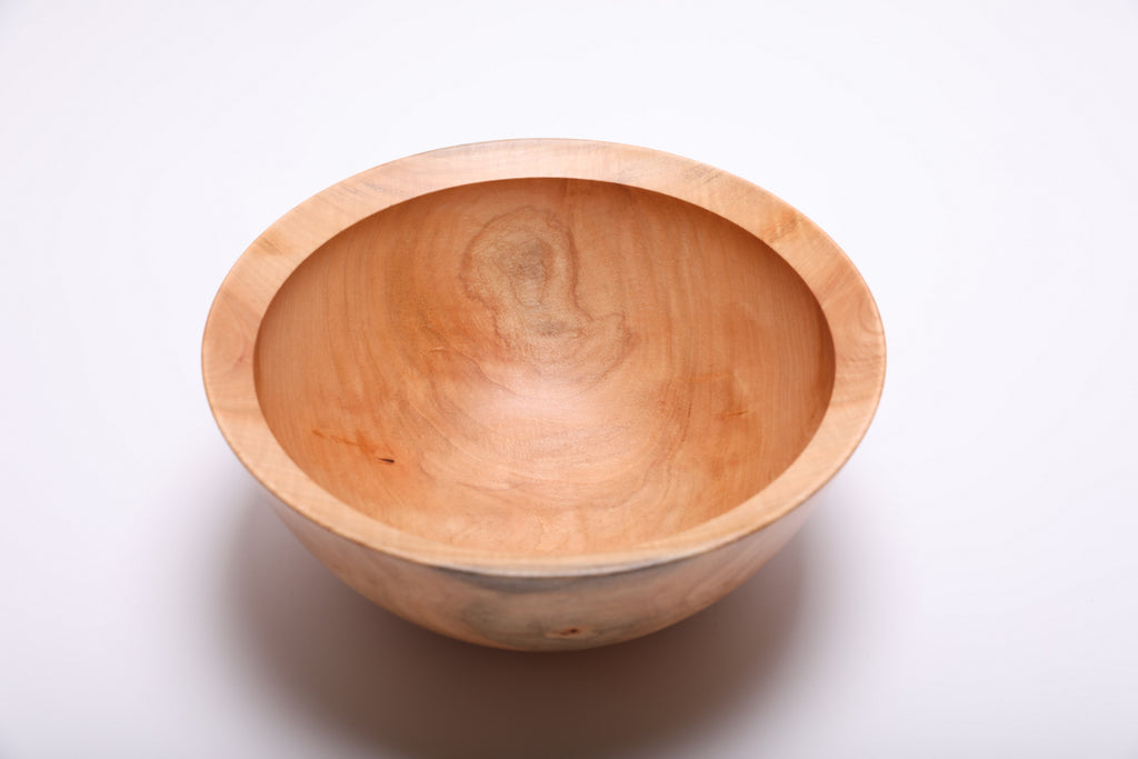 Overhead view of spalted sugar maple serving bowl showing full interior cavity and figured wood grain, 11 inches diameter