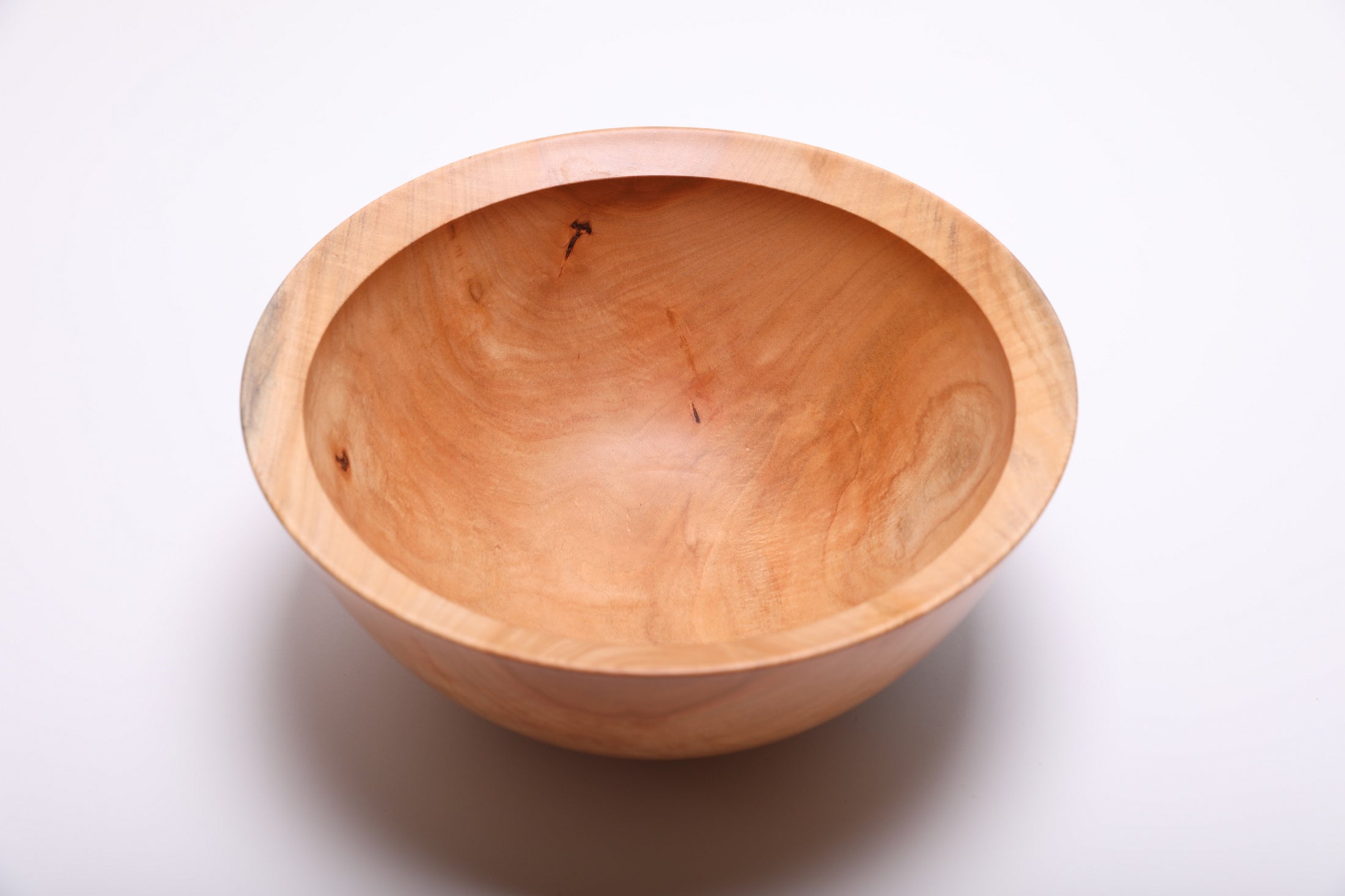 Top-down view of hand-turned spalted sugar maple fruit bowl displaying contrasting light and dark wood tones with spalted markings