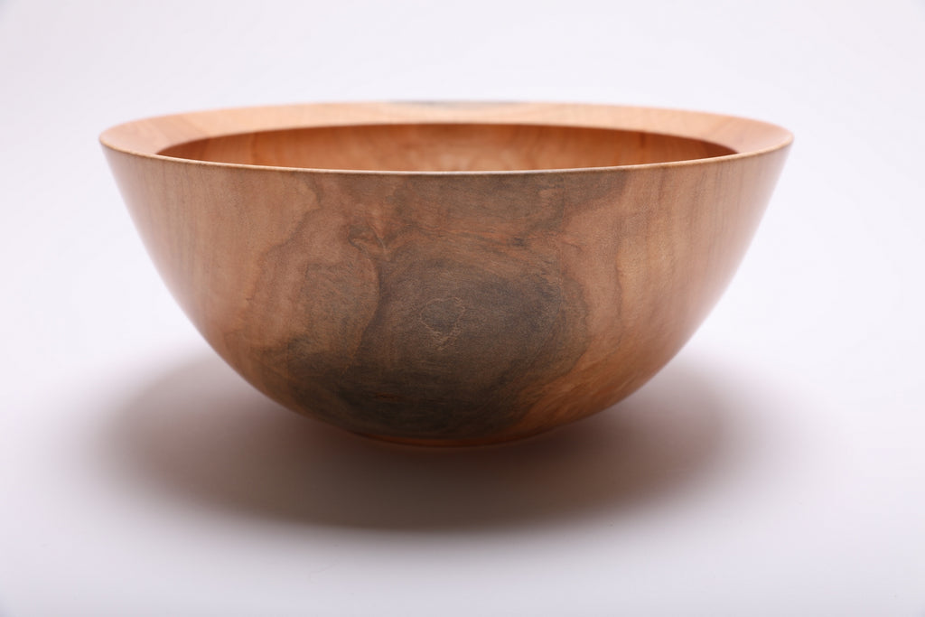 Side profile of hand-turned spalted sugar maple bowl revealing wall thickness and elegant tapered silhouette
