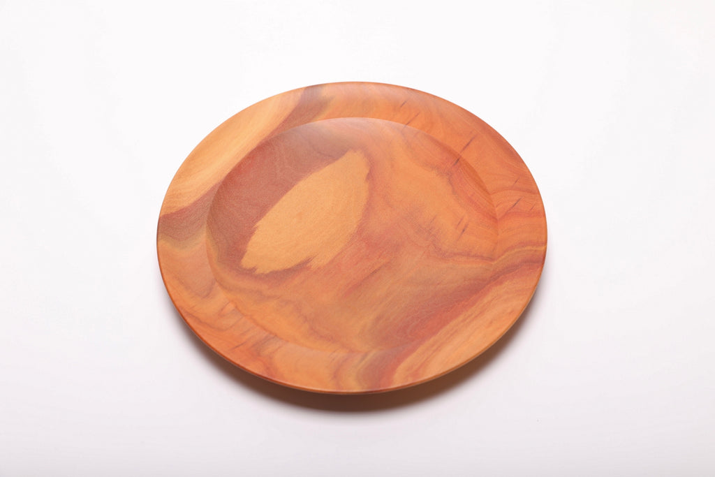 Top-down view of pink ivory ring dish highlighting deep pink color and fine grain detail, handmade in NC USA