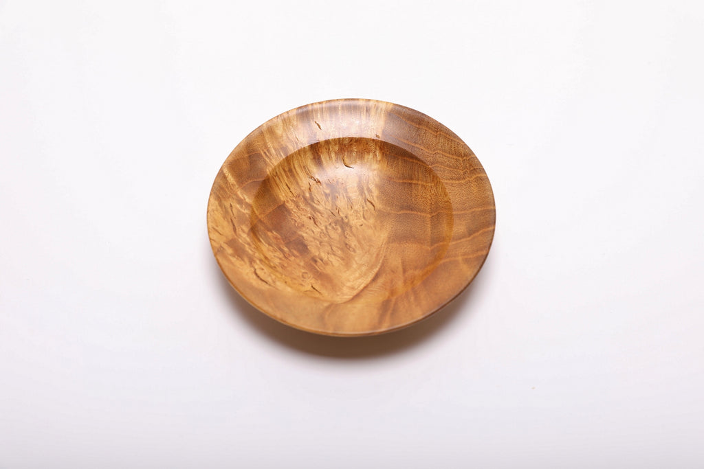 Top view of mulberry burl jewelry dish Top view of mulberry burl jewelry dish rotated 90 degrees revealing bamboo and chicken foot figure radiating from center