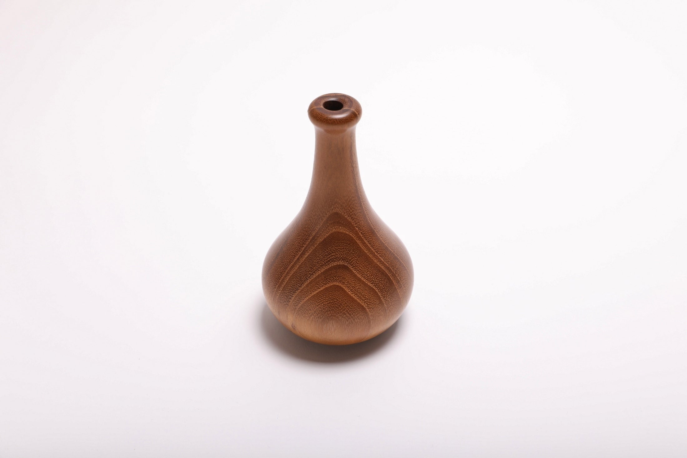 Black locust wooden weed pot rotated 180 degrees showing exterior grain and slender neck profile, handmade in NC USA
