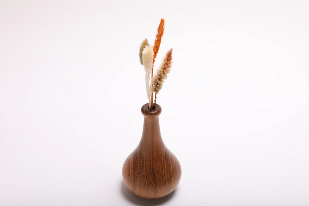 Black locust wooden weed pot with dried flowers rotated 180 degrees displaying full floral arrangement and wood grain