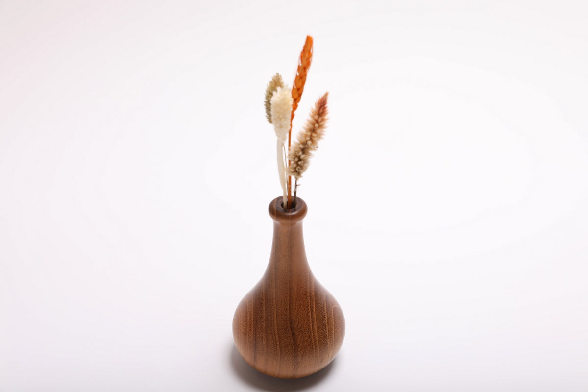 Black locust wooden weed pot with dried flowers rotated 180 degrees displaying full floral arrangement and wood grain