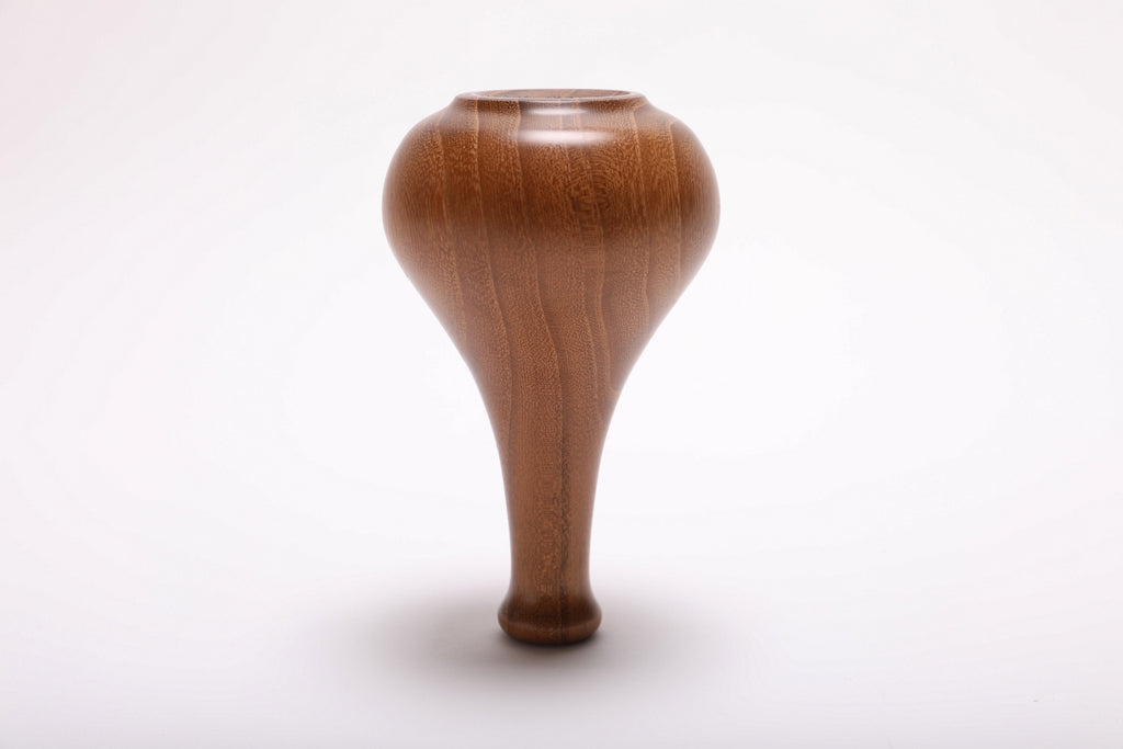 Bottom view of hand-turned black locust weed pot showing turned base and natural oil finish