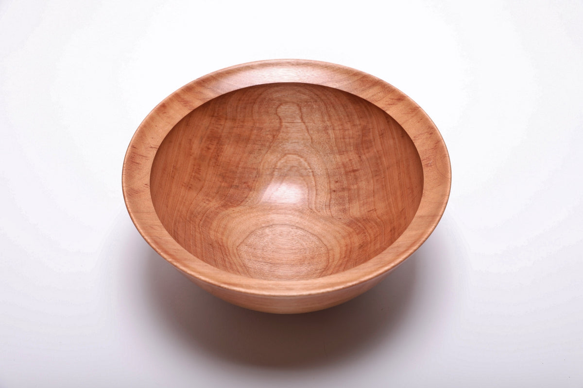 Overhead view of hand-turned river birch bowl rotated 180 degrees showing full grain pattern and cinnamon wood tones