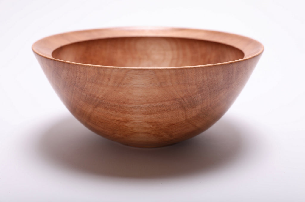 Side view of river birch wooden bowl rotated 180 degrees showing exterior grain iridescence and natural oil finish