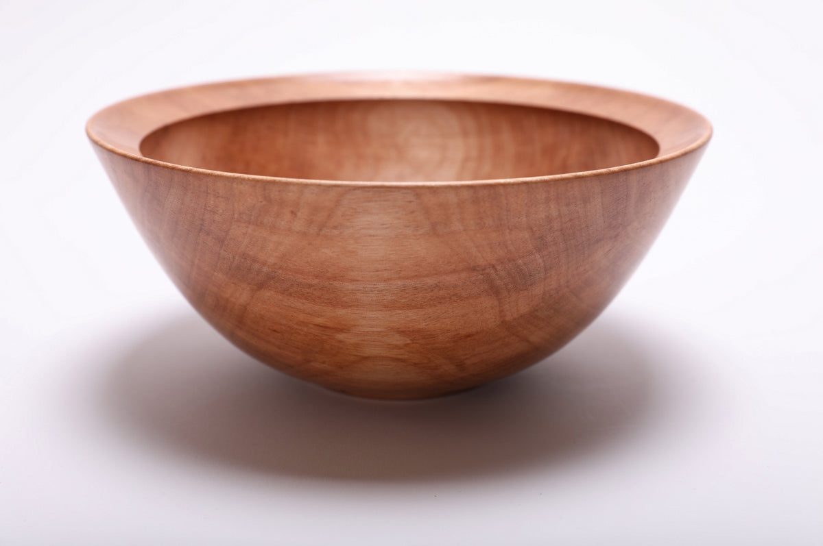 Side view of river birch wooden bowl rotated 180 degrees showing exterior grain iridescence and natural oil finish
