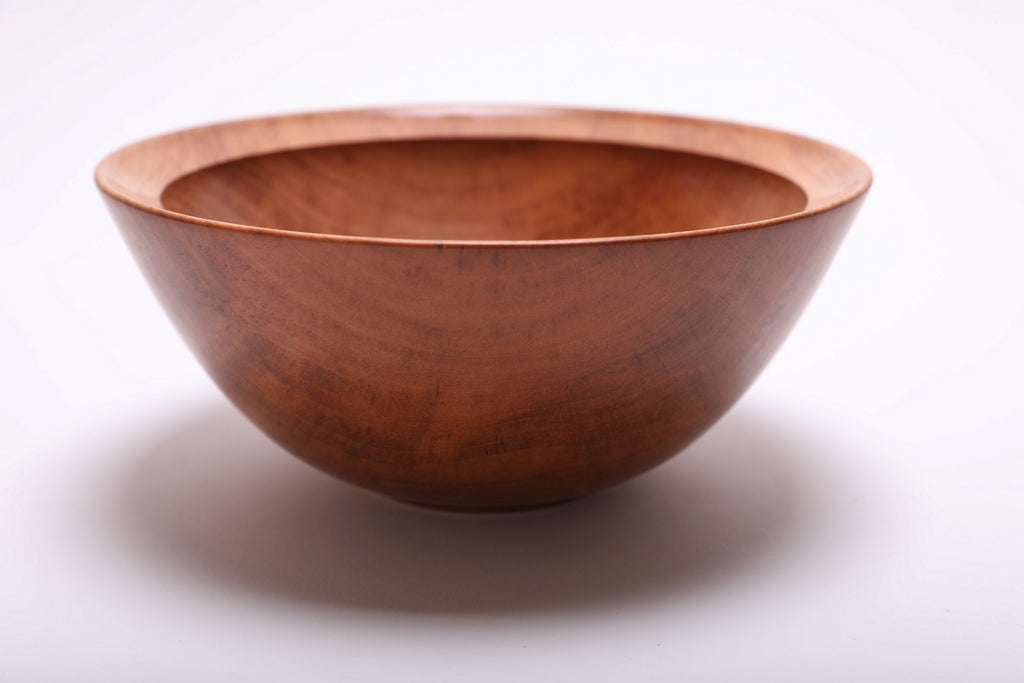 Side angle of river birch wood bowl rotated 270 degrees highlighting raised foot detail and smooth curved taper form