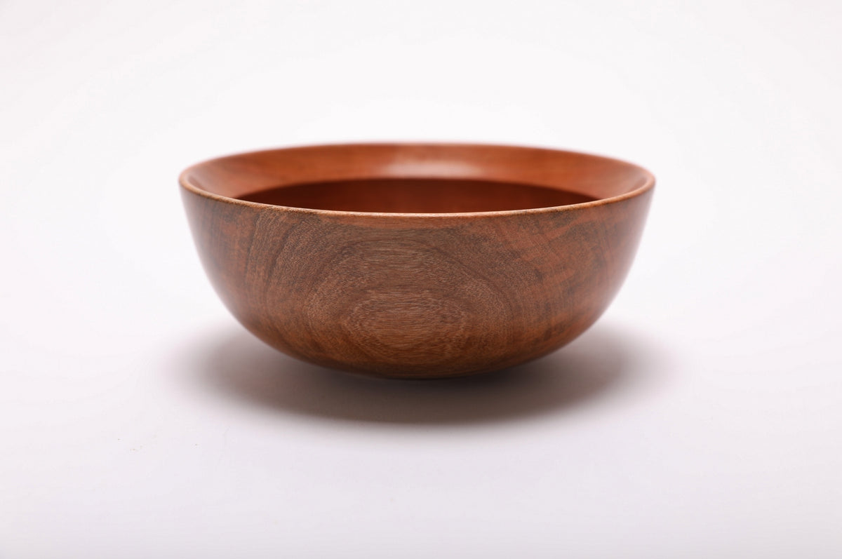 Wild black cherry wooden bowl side view, curved taper rim with raised foot and undercut rim